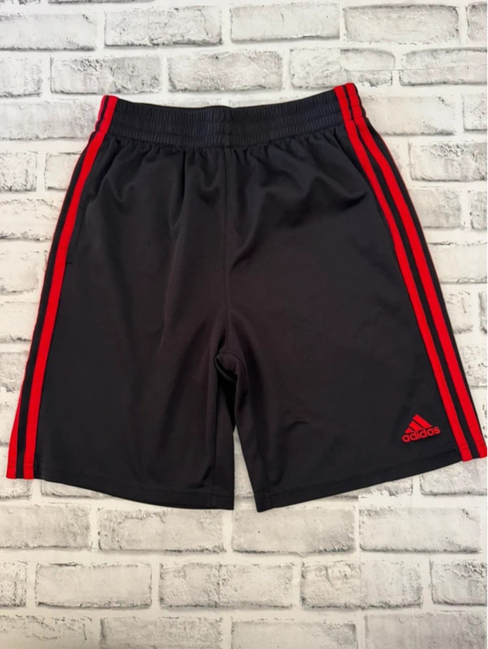 Boy’s Adidas black with red stripes shorts size 14/16